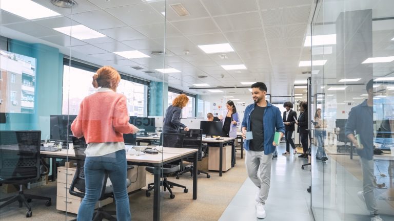 glosario verse colleagues entering creative workspace 2024 04 15 18 47 46 utc